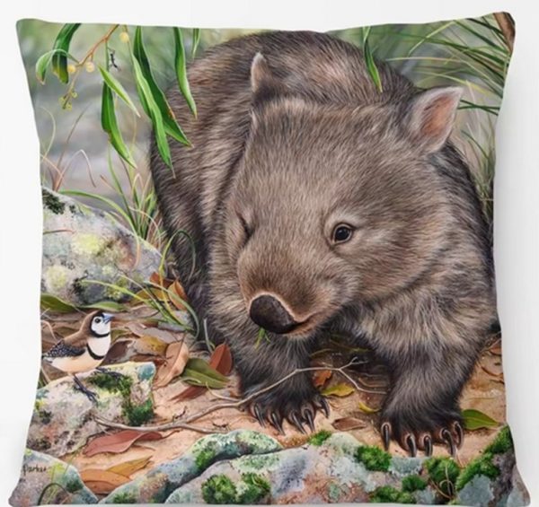 Wombat beside a small bird. cushion cover