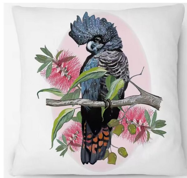 Cushion cover with Red Tail Black Cockatoo perched on branch.