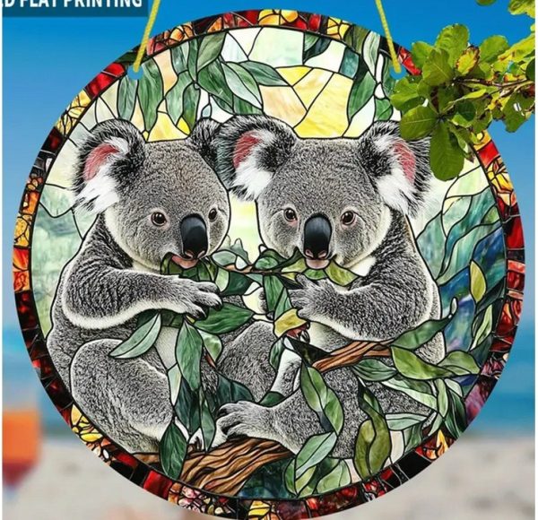 Sun Catcher with Two koalas eating eucalyptus leaves.